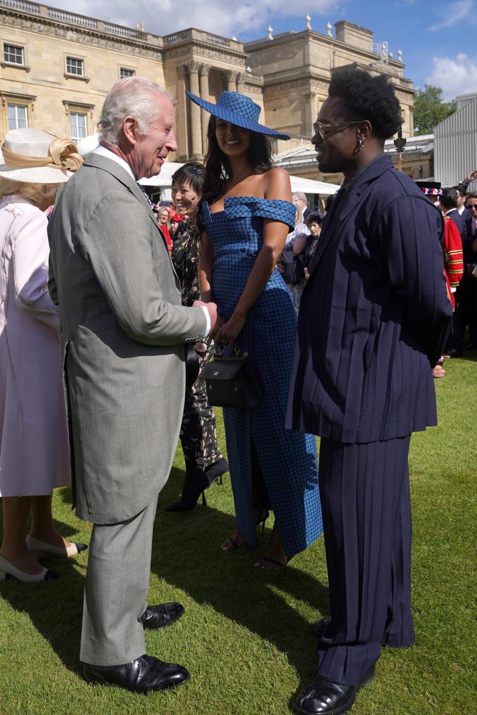 Maya Jama and Campbell Addy speaking to the King about whether he watches Love Island (Getty Images)