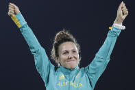 FILE - In this Aug. 19, 2016, file photo, Chloe Esposito of Australia celebrates winning the gold medal at the awards ceremony of the women's modern pentathlon at the Summer Olympics in Rio de Janeiro, Brazil. Esposito announced in late January that a “wonderful, unexpected surprise” had occurred and that the Australian wouldn’t be able to defend her modern pentathlon gold medal at the Tokyo Olympics. She was pregnant with her first child. Two months later Esposito and thousands of other Olympic athletes learned that the Tokyo Games would be put off by a year until July 2021 because of the coronavirus pandemic. While for some it meant more time to recover from injuries or extra time to prepare, Esposito realized it might give her a second chance to be in Tokyo next year. (AP Photo/Natacha Pisarenko, File)