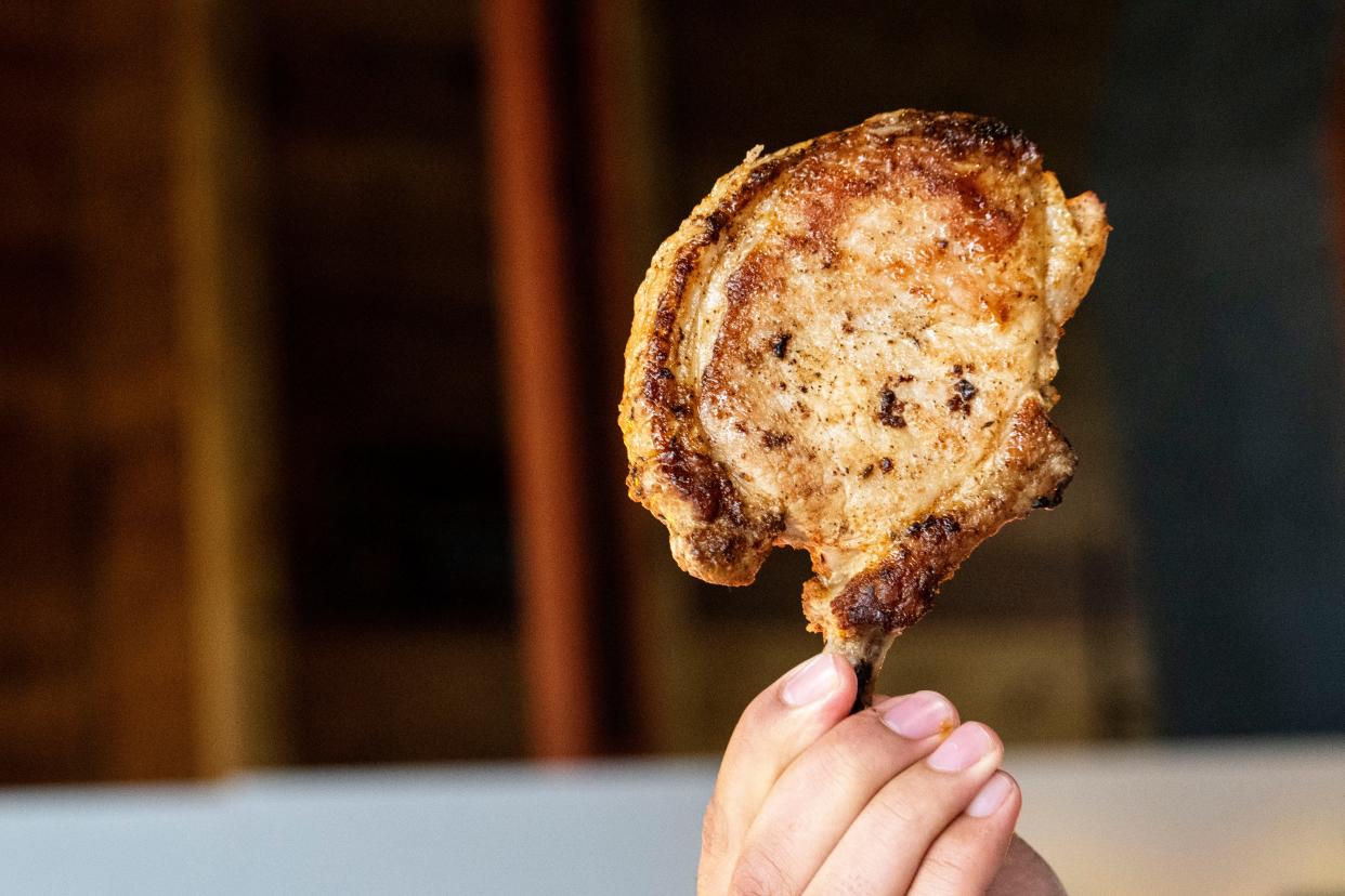 A pork chop on a stick at Adventureland on Thursday, April 18, 2024, in Altoona.