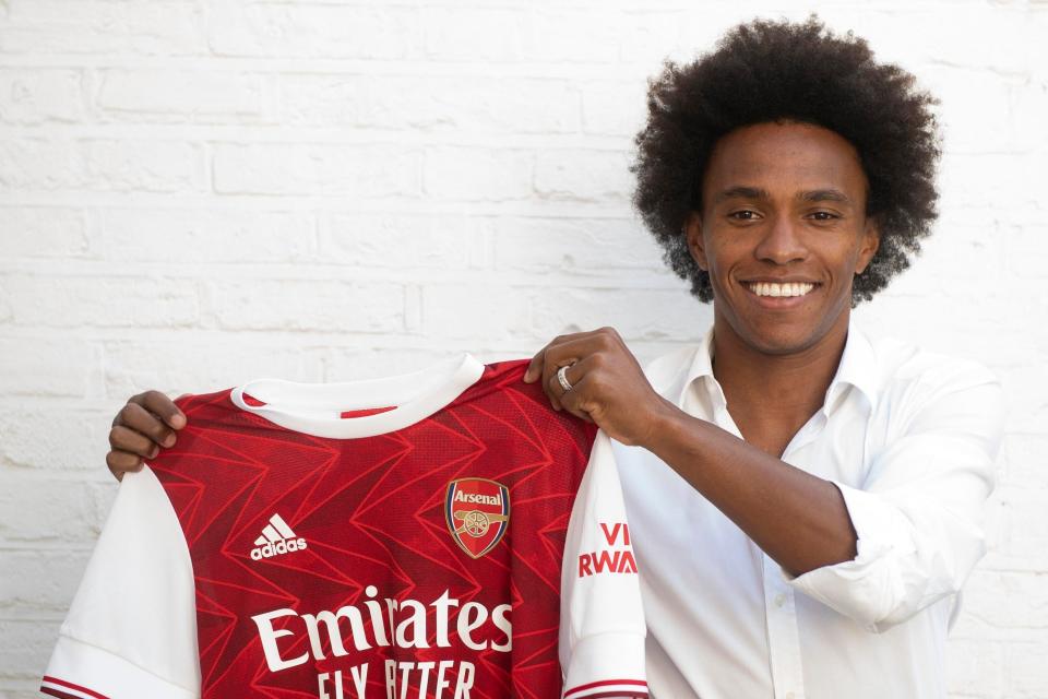 Arrival: Willian holds up new Arsenal home shirt Photo: Arsenal FC, via Getty Images