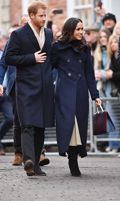 Prince Harry and Meghan Markle walking together in Nottingham