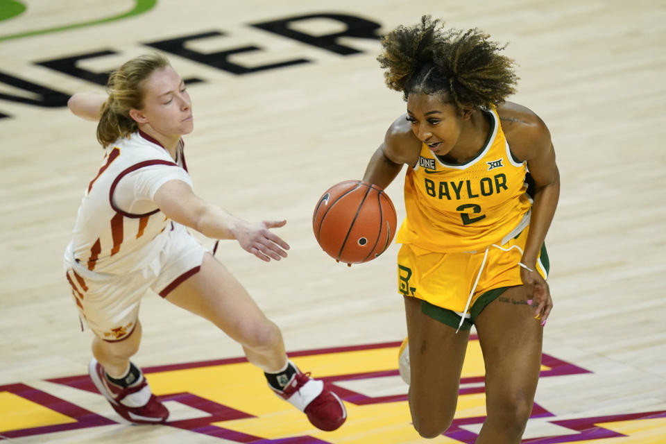 Baylor guard DiDi Richards (2) drives past Iowa State guard Emily Ryan, left, during the second half of an NCAA college basketball game, Sunday, Jan. 31, 2021, in Ames, Iowa. Baylor won 85-77. (AP Photo/Charlie Neibergall)