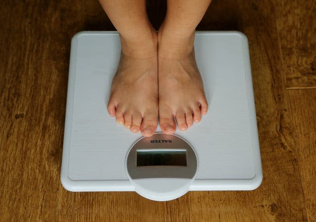 Child being weighed