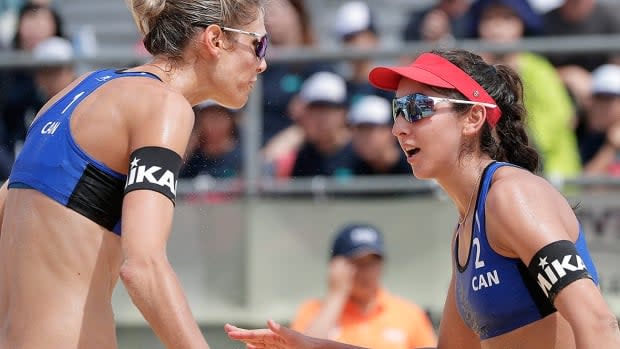 Beach volleyball world champions Sarah Pavan, left, and Melissa Humana-Paredes of Canada are getting back in the groove of competition ahead of the Tokyo Olympic tournament.  (Kiyoshi Ota/Getty Images/File - image credit)