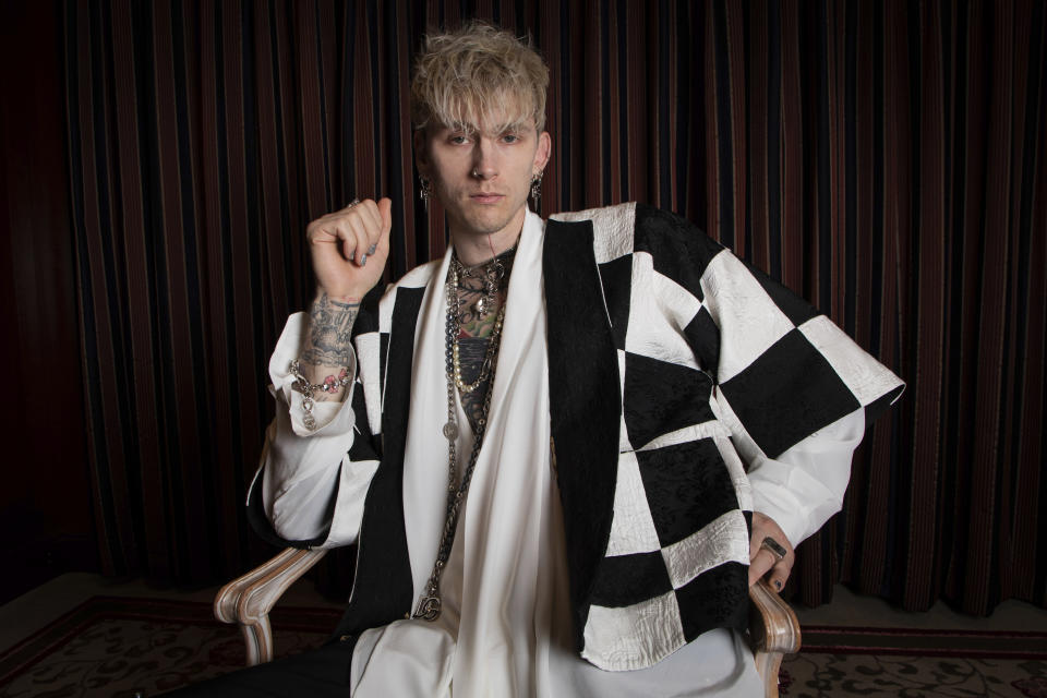 FILE - Actor-musician Colson Baker, also known as Machine Gun Kelly, poses for a portrait to promote the film "Taurus" during the International Film Festival Berlin 'Berlinale', in Berlin, Germany on Feb. 13, 2022. Baker plays Cole Taurus, a troubled rocker searching endlessly for the inspiration to record one final song. (Photo by Vianney Le Caer/Invision/AP, File)