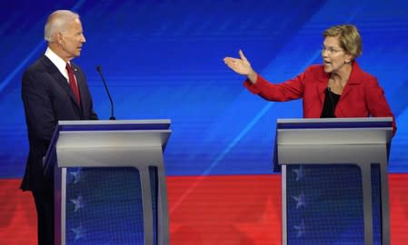 Senator Warren gestures towards former Vice President Biden as she speaks during the 2020 Democratic U.S. presidential debate in Houston, Texas, U.S.