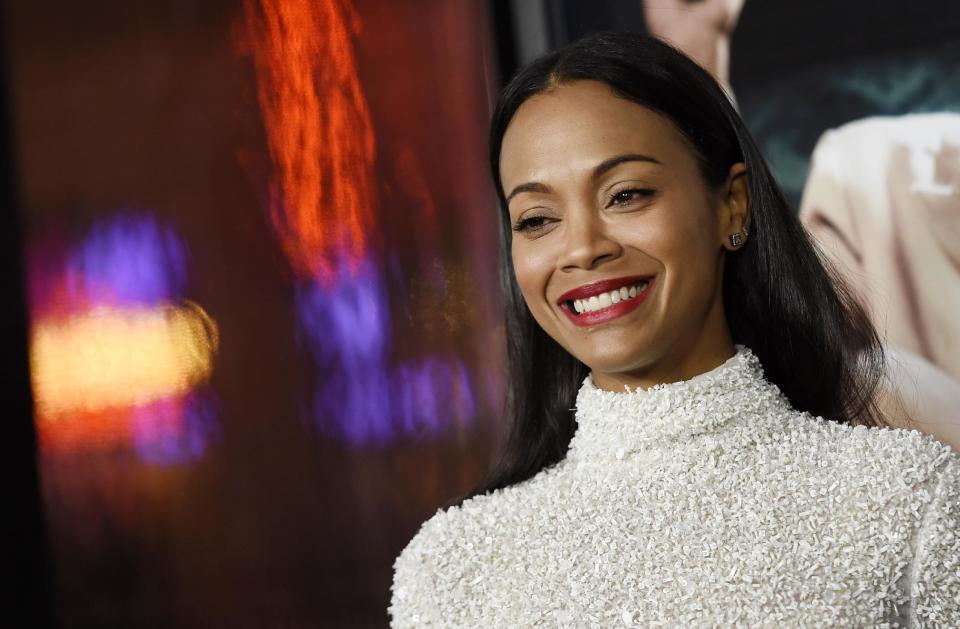 Zoe Saldana, a cast member in “Live by Night,” poses at the premiere of the film at the TCL Chinese Theatre on Monday, Jan. 9, 2017 in Los Angeles. (Photo by Chris Pizzello/Invision/AP)