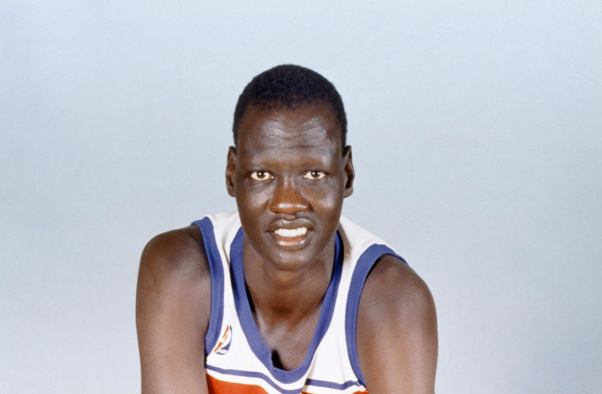 Manute Bol was listed at 23 years old when he joined the Washington Bullets in 1985. (AP)