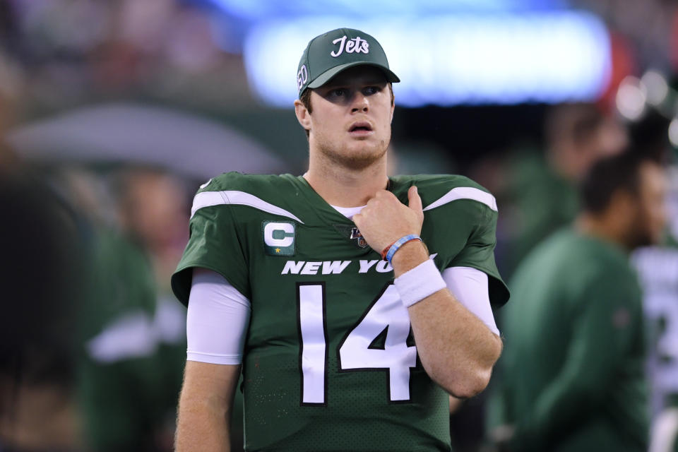New York Jets quarterback Sam Darnold (14) walks the sideline during the second half of an NFL football game against the New England Patriots, Monday, Oct. 21, 2019, in East Rutherford, N.J. (AP Photo/Bill Kostroun)