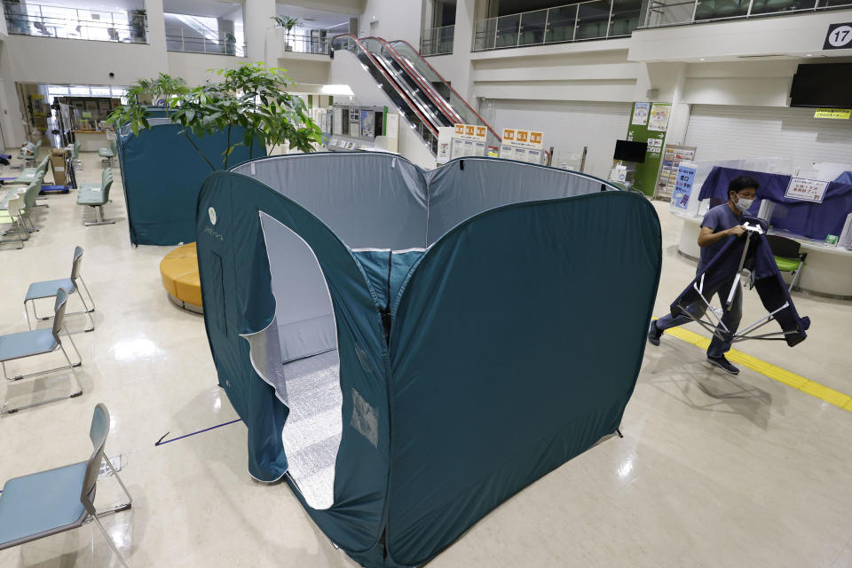 Shelters for the evacuees from Typhoon Hinnamnor are prepared at the municipal government building in Naha, Okinawa prefecture, Japan Sunday, Sept. 4, 2022. (Kyodo News via AP)