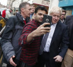 Britain's Prime Minister Boris Johnson has his picture taken during a General Election campaign stop in Wells, England, Thursday, Nov. 14, 2019. Britain goes to the polls on Dec. 12. (AP Photo/Frank Augstein, Pool)