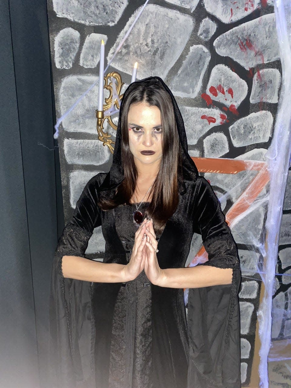 Sam Govoni Roderick is a mysterious figure in black for the Academy of Performing Arts Haunted House.