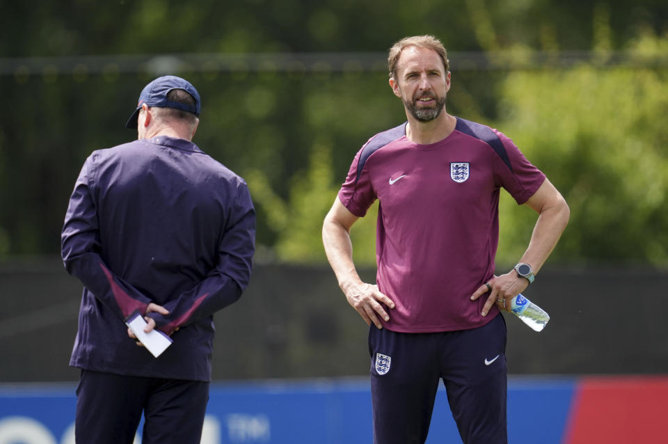 England manager Gareth Southgate during a training session at the Spa & Golf Resort Weimarer Land in Blankenhain, Germany, Saturday June 29, 2024. Gareth Southgate was credited with making England fans fall back in love with their national soccer team. Now many are turning on him. Southgate has been a largely unifying force for the national team during a period of upheaval and uncertainty in English politics and culture, but after nearly eight years and four major tournaments, the European Championship appears to signal a shift in opinion toward him. (Adam Davy/PA via AP)