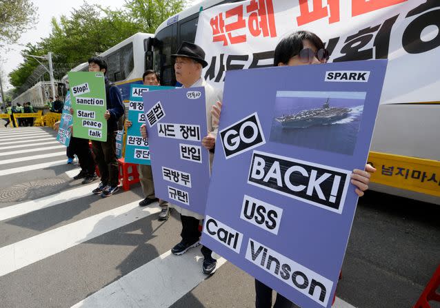 <span class="article-figure-source">South Korean protesters stage a rally against US deployment of the USS Carl Vinson aircraft carrier and its battle group to the Korean Peninsula. Source: AP</span>