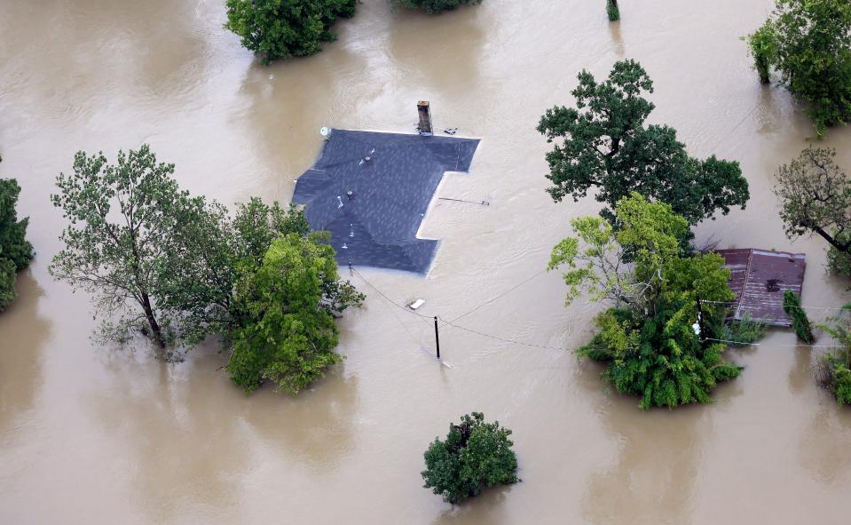 hurricane Harvey flooding in Houston covers homes up to the roofs