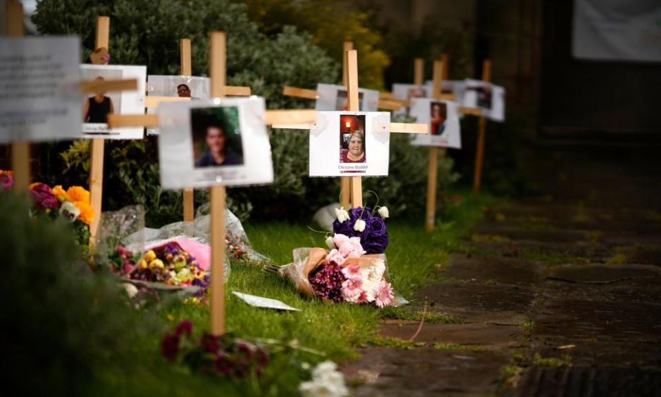 Photographs and messages at Riverside Church in Burton-on-Trent, Staffordshire.