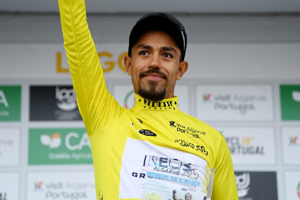 LAGOAPRAIA DO CARVOEIRO ALGARVE PORTUGAL  FEBRUARY 19 Daniel Martinez of Colombia and Team INEOS Grenadiers celebrates at podium as Yellow Leader Jersey winner during the 49th Volta ao Algarve em Bicicleta 2023 Stage 5 a 244km individual time trial stage from Lagoa to Lagoa  VAlgarve2023  on February 19 2023 in Lagoa Algarve Portugal Photo by Tim de WaeleGetty Images