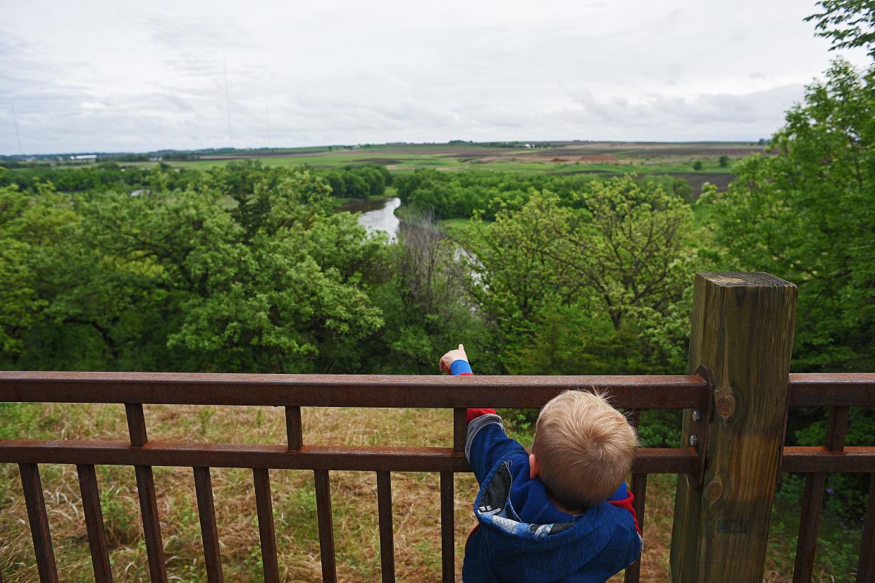 August Jarzynka, 3, takes in the view from one of the new lookout decks at Good Earth State Park while hiking with his dad Luke Jarzynka, of Sioux Falls, and brother Blaise, 1, Wednesday, May 17, 2017, southeast of Sioux Falls. A public dedication event will be held on Friday for the park's new visitors center. 