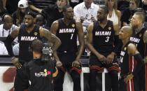 Miami Heat's (L-R) LeBron James, Chris Bosh, Dwyane Wade, Ray Allen and Chris Andersen wait to enter the game against the San Antonio Spurs during the third quarter in Game 5 of their NBA Finals basketball series in San Antonio, Texas, June 15, 2014. REUTERS/Mike Stone (UNITED STATES - Tags: SPORT BASKETBALL)