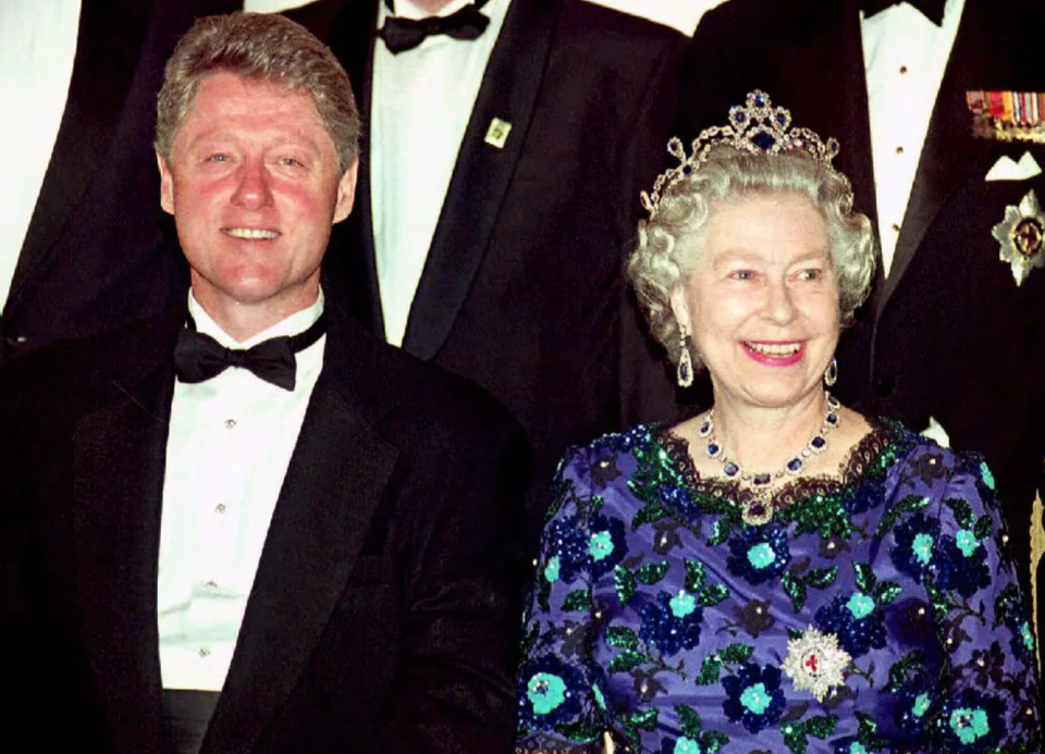 Bill Clinton and the Queen. (Getty)