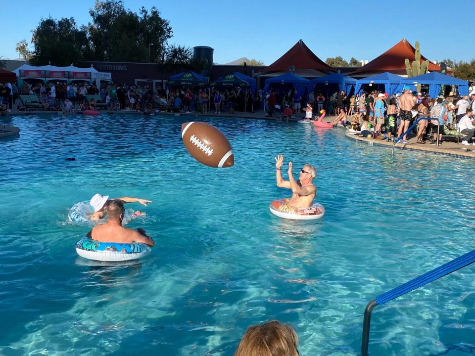 Attendees party in the pool at Gronk Beach.