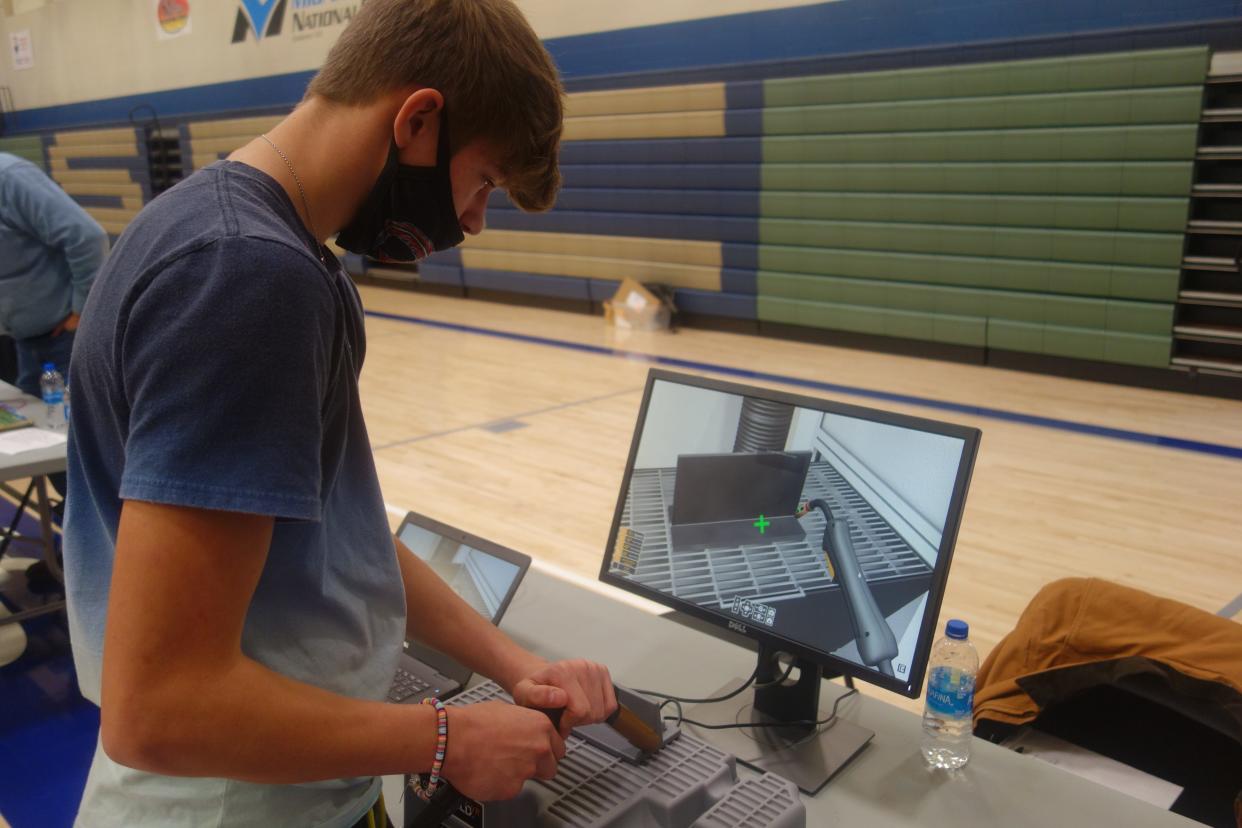 Attendees at the Tenth Grade Career Expo hosted by Spoon River College were able to try their welding skills using a simulator.