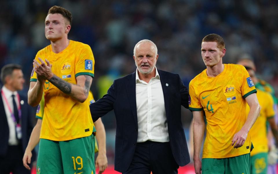 Australia manager Graham Arnold consoles his players/Australia World Cup 2022 squad list, fixtures and latest odds - GETTY IMAGES