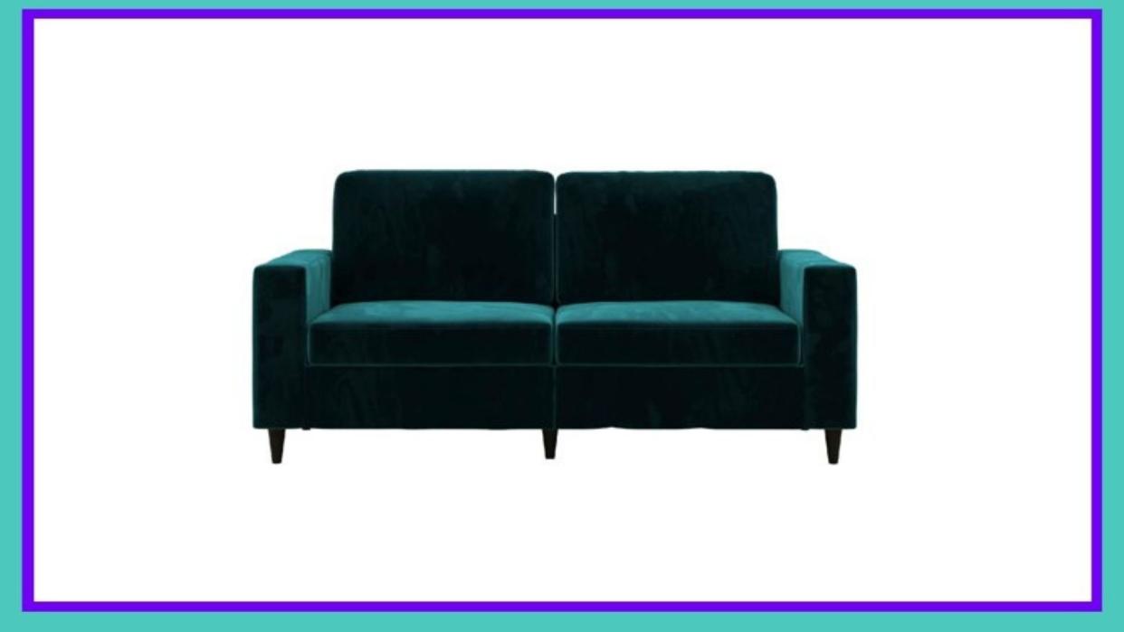 Green velvet gives this couch a rich look. (Photo: Walmart) 