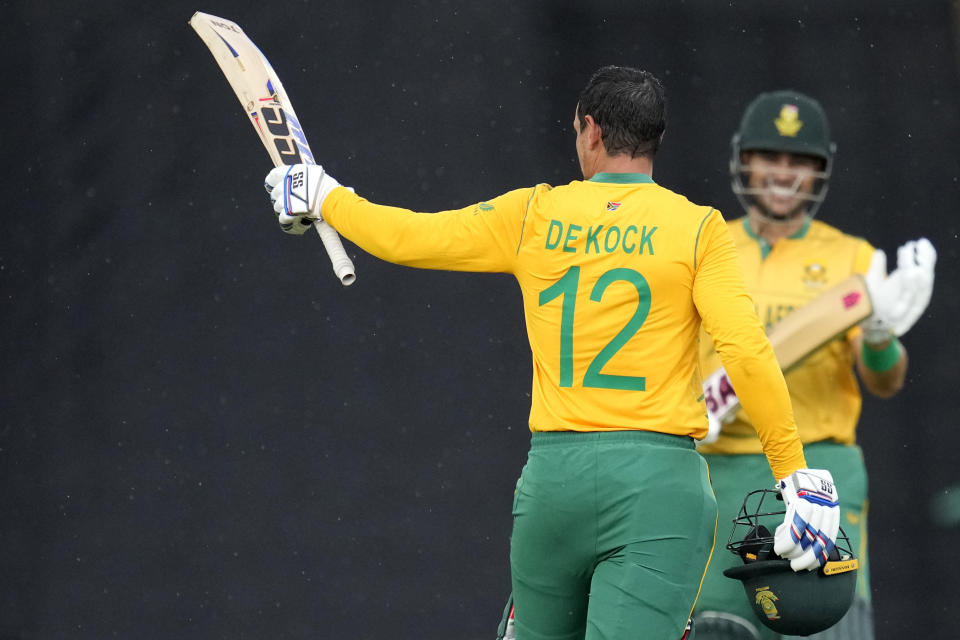 South Africa's Quinton de Kock celebrates his century during the second T20 cricket match between South Africa and West Indies, at Centurion Park, in Pretoria, South Africa, Sunday, March 26, 2023. (AP Photo/Themba Hadebe)