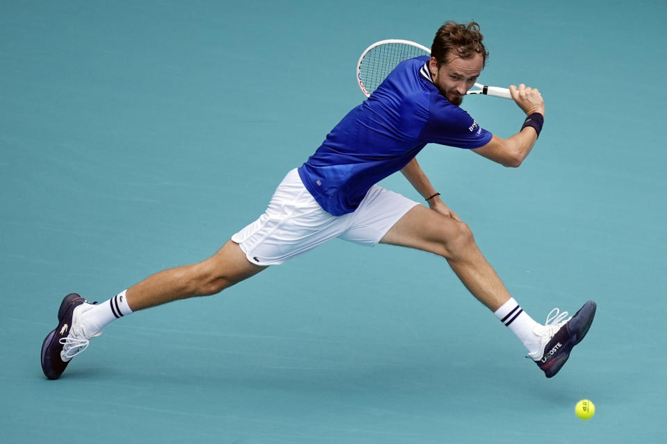 Daniil Medvedev runs to play a return to Dominik Koepfer, of Germany, in their men's singles match at the Miami Open tennis tournament, Tuesday, March 26, 2024, in Miami Gardens, Fla. (AP Photo/Rebecca Blackwell)