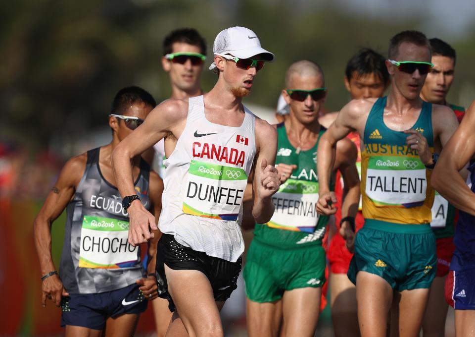 <p>For a single afternoon, Richmond, B.C.’s Evan Dunfee was an Olympic bronze medallist. The race walker was eventually bumped back to fourth place in the 50-kilometre event after a controversial ruling. With about a kilometre to go, Hirooki Arai of Japan bumped Dunfee in third while trying to pass him. Arai was quickly disqualified from the event and stripped of his bronze medal, bumping Dunfee onto the podium. Several hours later, Japan had successfully appealed the ruling, pushing Dunfee back down to fourth place. "The second I saw the video I didn’t think it was anything worth disqualifying him over,” Dunfee said. “We had the option to appeal the Japanese decision to the Court of Arbitration for Sport. I told our team I didn’t want to pursue that. “The first thing he said to me was he was sorry and I think that was a big testament to the kind of person he is." Click <a rel="nofollow" href="https://ca.sports.yahoo.com/news/canadas-evan-dunfee-says-doing-193850420.html" data-ylk="slk:here;elm:context_link;itc:0;sec:content-canvas;outcm:mb_qualified_link;_E:mb_qualified_link;ct:story;" class="link  yahoo-link">here</a> to read more. </p>