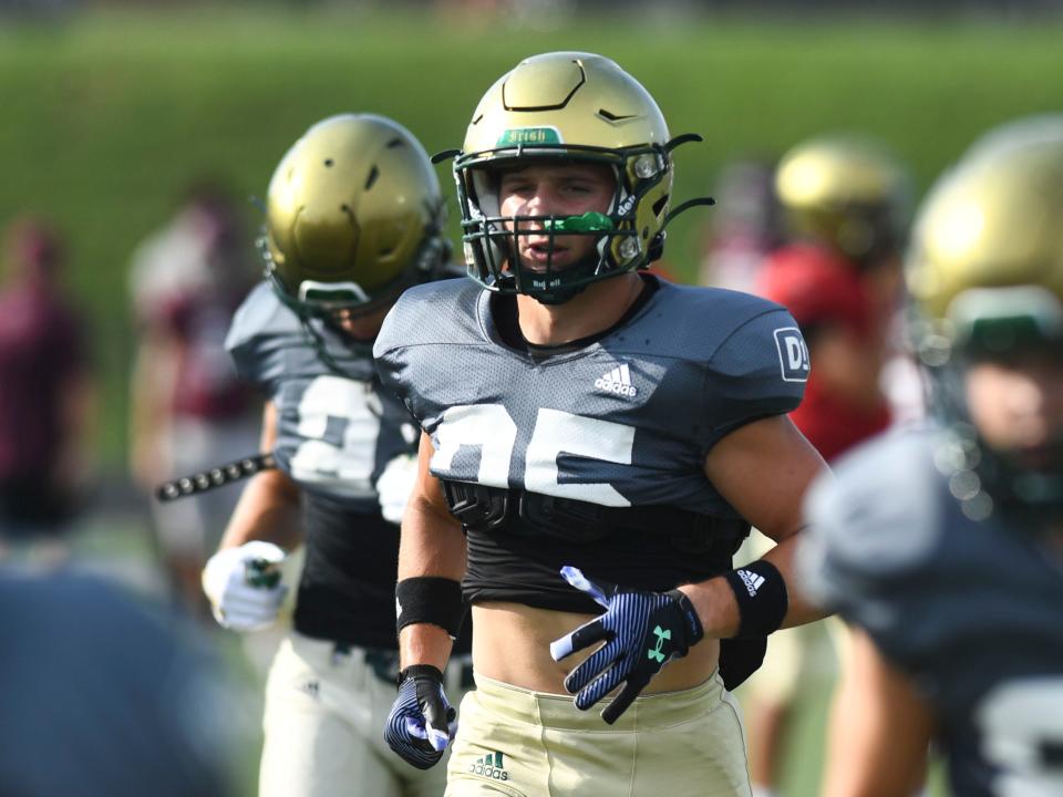 Knoxville Catholic's Braylon Harmon warming up before teh start of a scrimmage against Bearden in Knoxville,Tenn. on Friday, July 28, 2023.