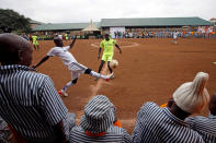 <p>Kenyan prisoners watch a mock World Cup soccer match between Russia and Saudi Arabia, as part of a monthlong soccer tournament involving eight prison teams at the Kamiti Maximum Security Prison, Kenya’s largest prison facility, near Nairobi, on June 14, 2018. (Photo: Baz Ratner/Reuters) </p>