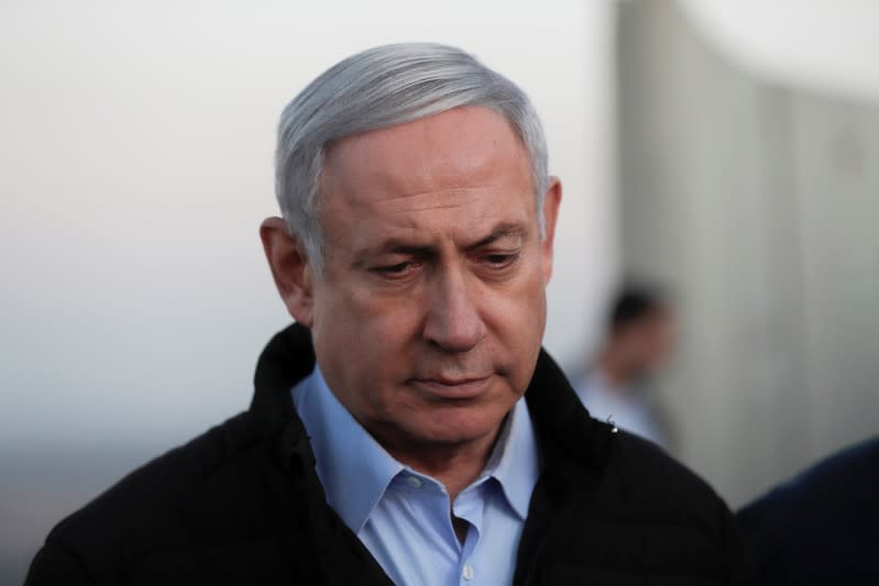 Israeli Prime Minister Benjamin Netanyahu visits an Israeli army base in the Israeli-occupied Golan Heights