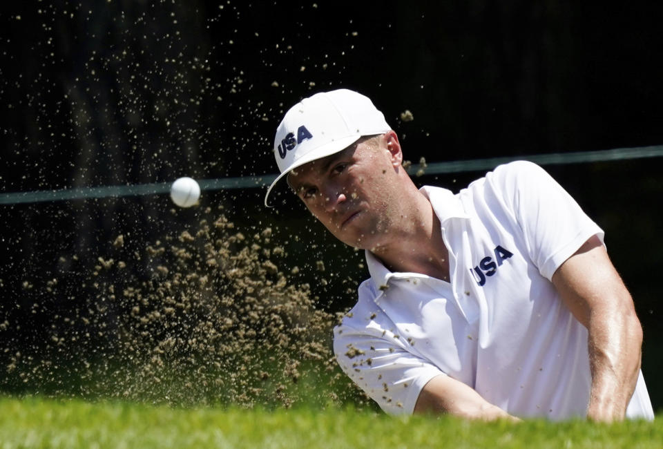 United States' Justin Thomas plays a shot from a bunker during a practice round of the men's golf event at the 2020 Summer Olympics, Tuesday, July 27, 2021, at the Kasumigaseki Country Club in Kawagoe, Japan, (AP Photo/Matt York)