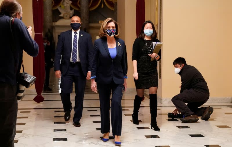 U.S. House Speaker Nancy Pelosi (D-CA) walks outside the House chamber as the House prepares to vote on a resolution demanding Vice President Pence and the cabinet remove President Trump from office, at the U.S. Capitol