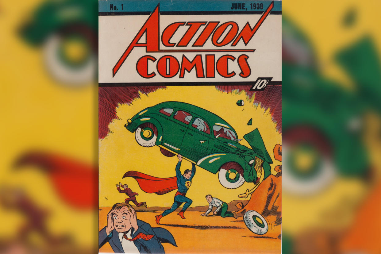 A photo of the 1938 Action Comics #1 featuring Superman, who is seen holding a car over his head.