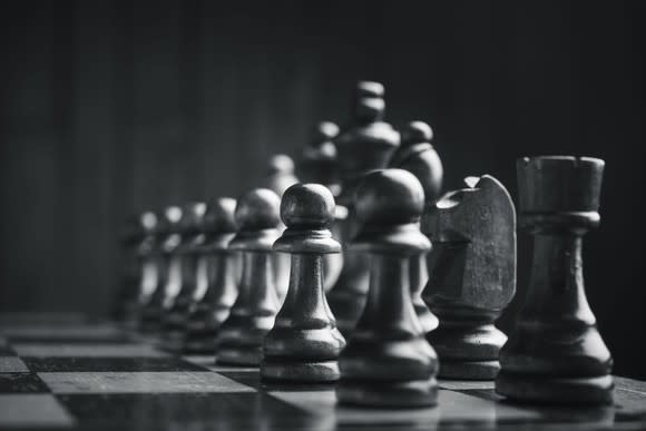 A chessboard at initial set-up. The black chess pieces are pictured.