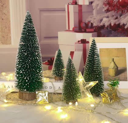 Or even create a small dining table display with these four mini trees