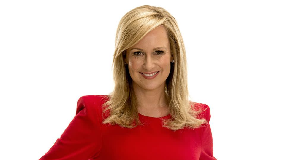 TV personality Melissa Doyle wearing a red dress in a promotional photo for Channel Seven