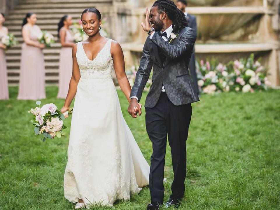 A bride and groom leave their wedding ceremony.