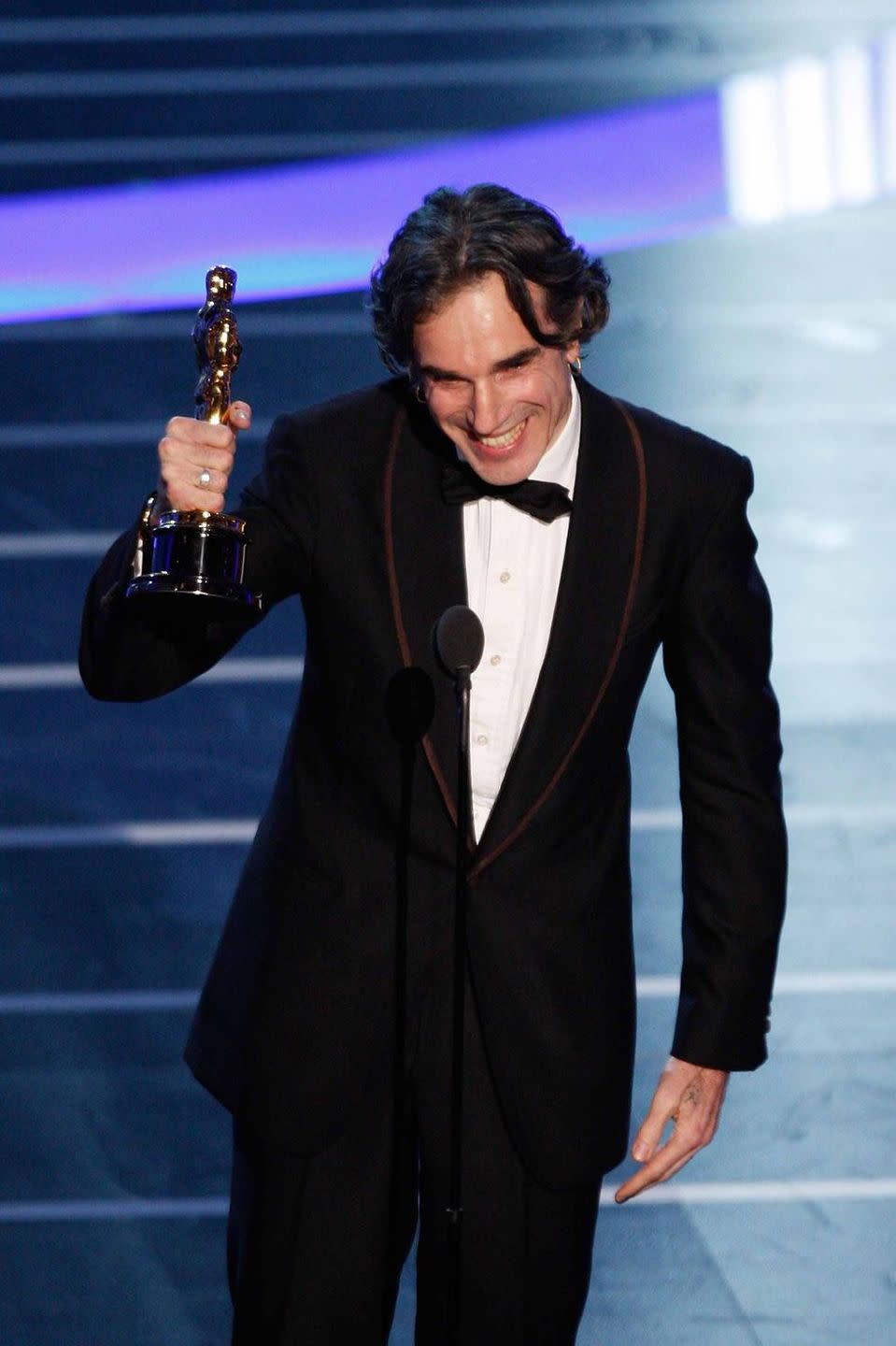 <p>As much of a chameleon on the carpet as in his films, every iteration of Daniel Day-Lewis's award-show style is impressive.</p>