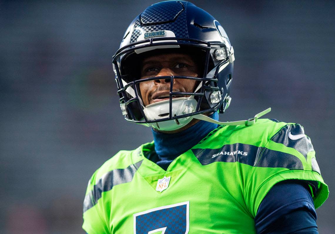 Seattle Seahawks quarterback Geno Smith (7) smiles at fans before the start of an NFL game against the San Francisco 49ers at Lumen Field in Seattle Wash. on Dec. 15, 2022.