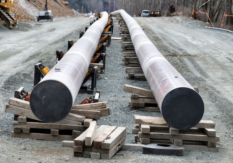 FILE PHOTO: The last section of pipeline is assembled on the Trans Mountain pipeline expansion project near Laidlaw