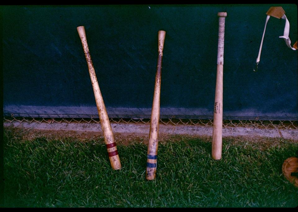 Bats weighing upwards of 40 oz. rest in the dugout of the Lordsburg Trollymen.