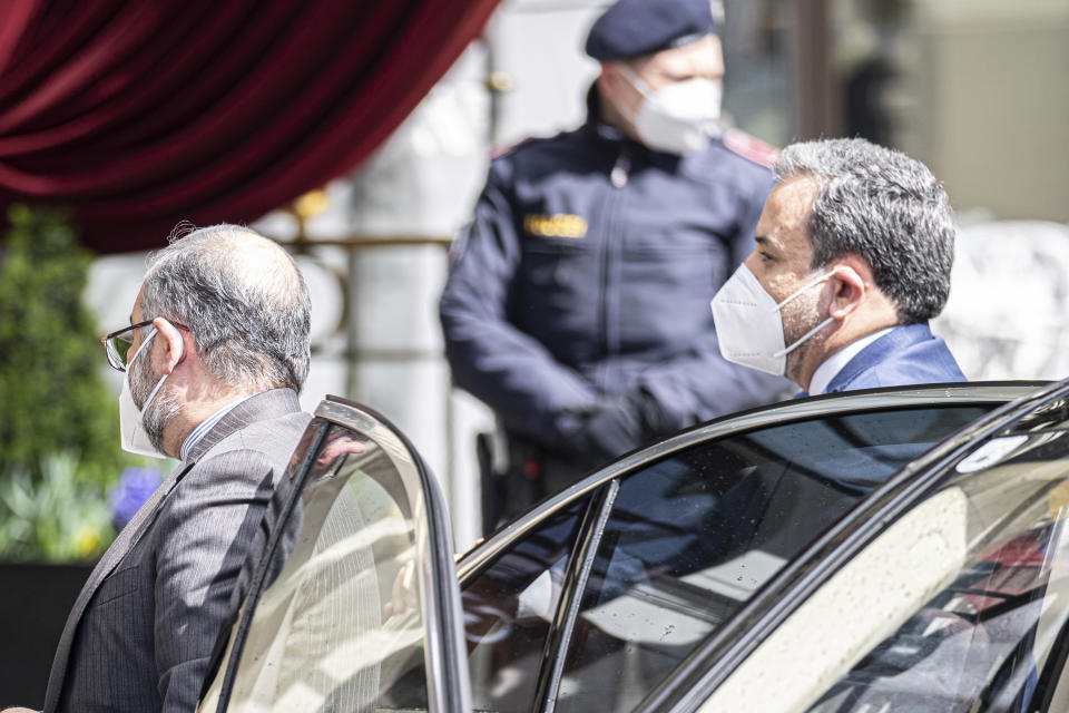 Political deputy at the Ministry of Foreign Affairs of Iran, Abbas Araghchi, right, arrives at the Grand Hotel Wien where closed-door nuclear talks with Iran take place in Vienna, Austria, Tuesday, April 6, 2021. Foreign ministry officials from the countries still in the accord, the so-called Joint Comprehensive Plan of Action, are meeting in Vienna to push forward efforts to bring the United States back into the 2015 deal on Iran's nuclear program. (AP Photo/Florian Schroetter)