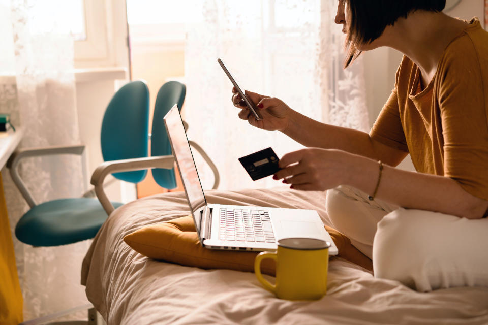 A woman ordering something on her cellphone