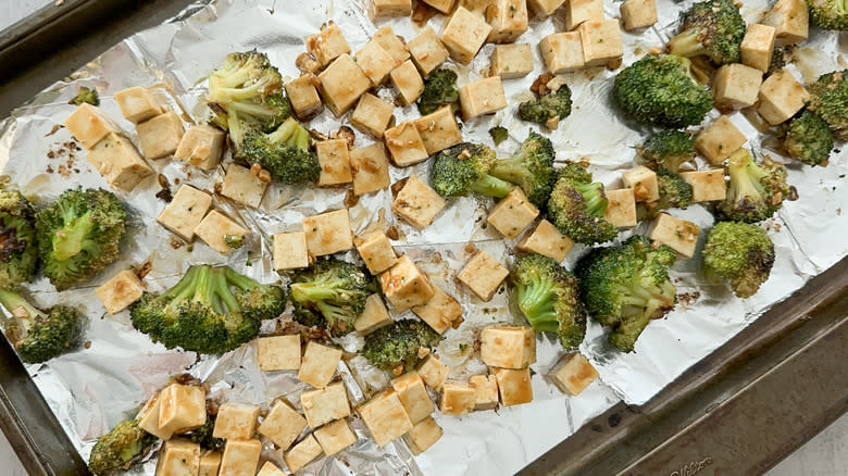 tofu and broccoli on baking sheet