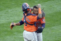 Houston Astros pitcher Framber Valdez, right, and catcher Martin Maldonado celebrate as the Astros beat the Minnesota Twins 4-1 in Game 1 of an American League wild-card baseball series, Tuesday Sept. 29, 2020, in Minneapolis. (AP Photo/Jim Mone)