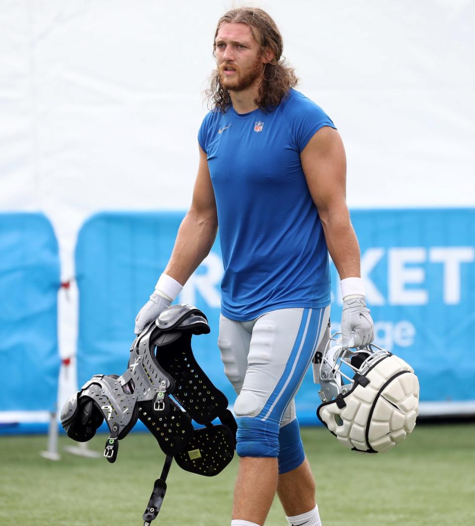 Lions tight end T.J. Hockenson leaves the field after preseason camp's first practice with pads Aug. 1, 2022 in Allen Park.
